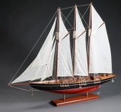TWO AMERICAN CARVED WOOD SHIP MODELS,