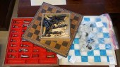 TWO CHESS SETS; ONE WITH STAINED TOOLED