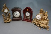 FOUR ASSORTED BRASS, MAHOGANY AND FRUITWOOD
