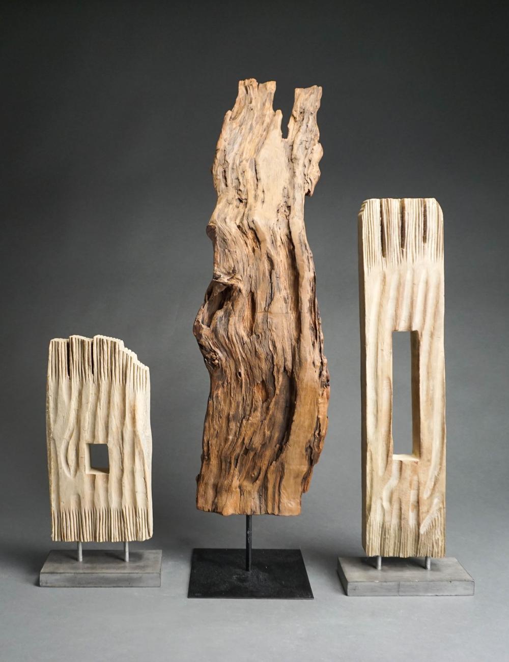 THREE CONTEMPORARY CARVED WOOD 32c0ad