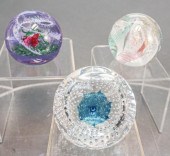 THREE CAITHNESS GLASS PAPERWEIGHTS IN