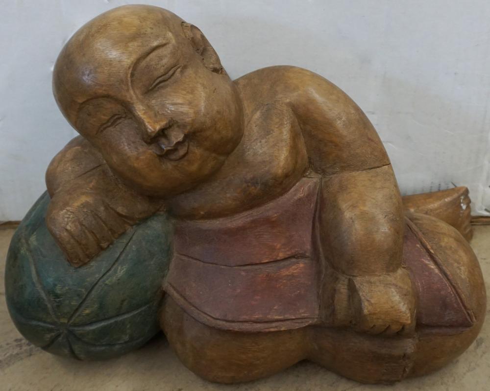 CHINESE CARVED WOOD FIGURE OF RECUMBENT 32df42