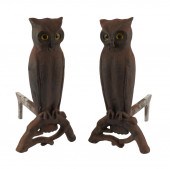 TWO CAST IRON OWL ANDIRONSwith glass