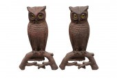 PAIR OF CAST IRON OWL ANDIRONSwith inset