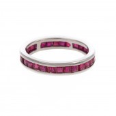 A 2.00 CTW RUBY ETERNITY BAND IN 18K
