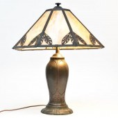 Spelter metal table lamp with slag glass