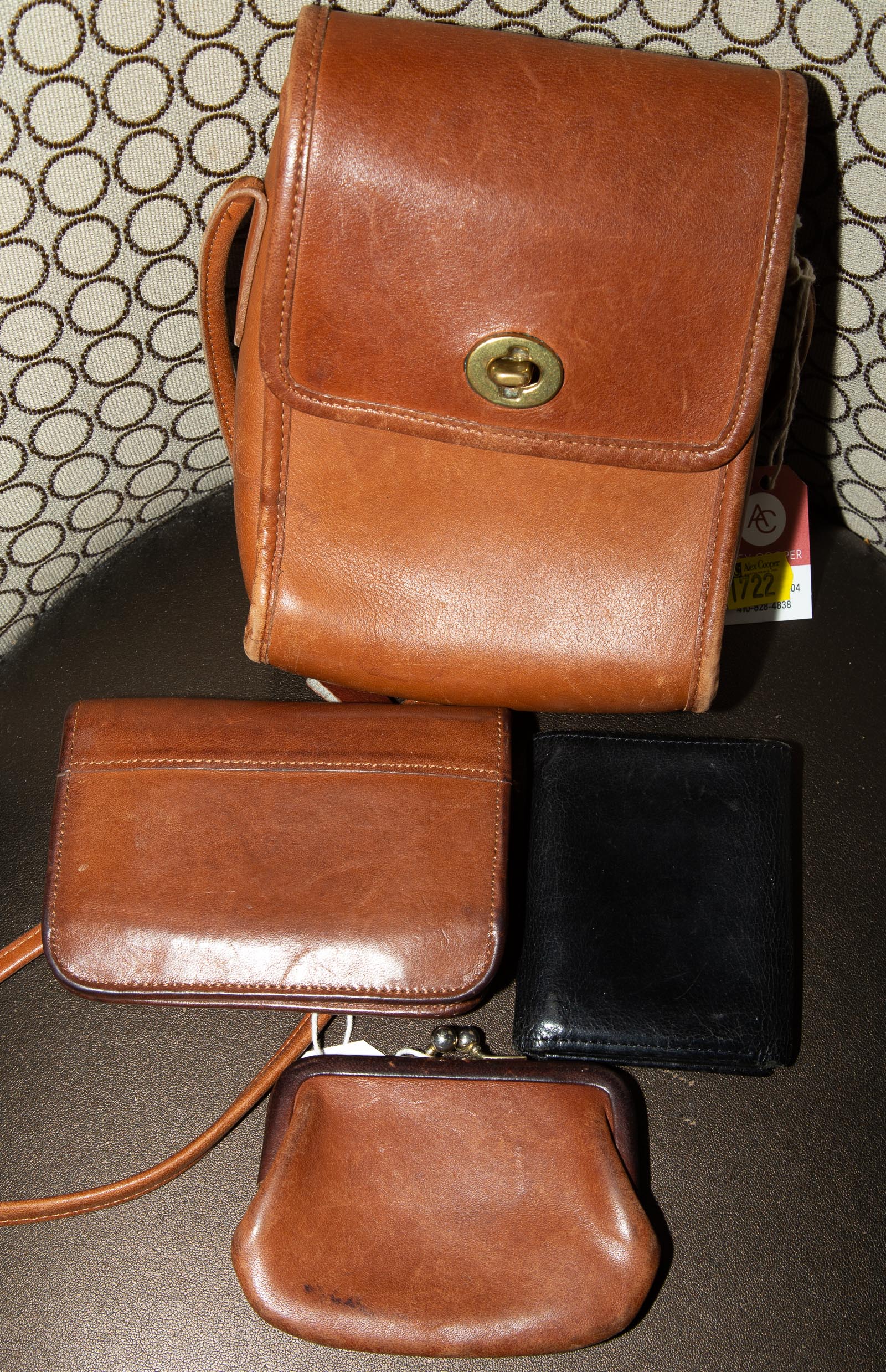 A BROWN LEATHER BAG THREE LEATHER 337b10