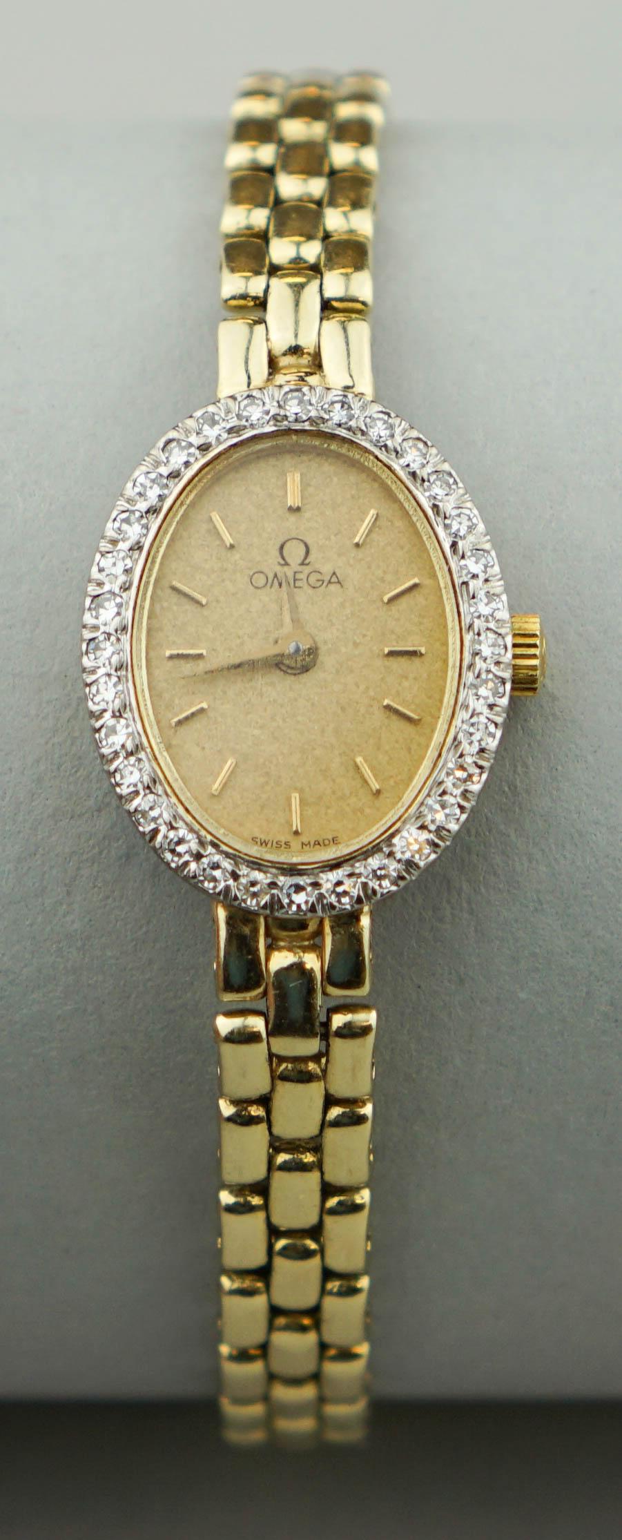 OMEGA LADIES 14K YELLOW GOLD AND 339b35
