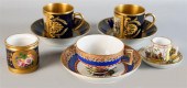 PAIR OF SEVRES NAPOLEONIC CUPS AND SAUCERS,