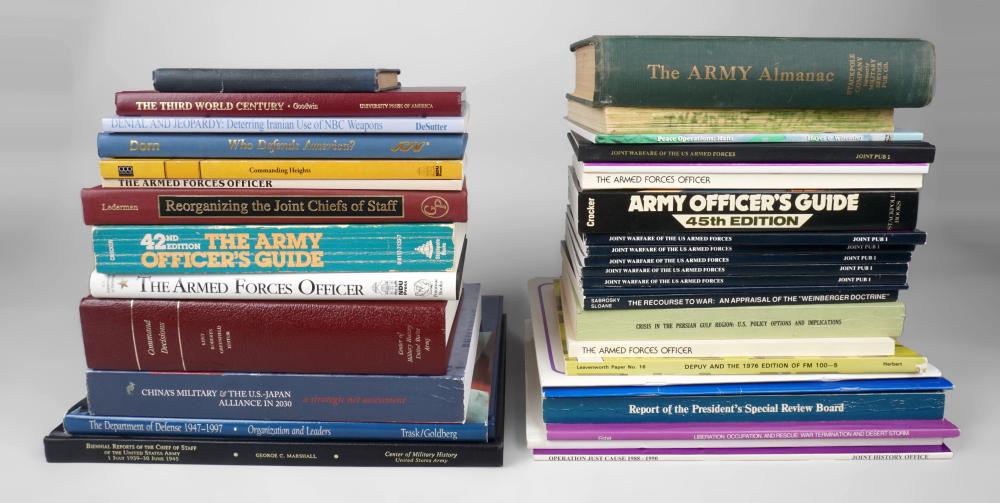 GROUP OF MILITARY POLICY BOOKS 33d133
