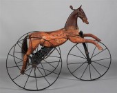 ANTIQUE HOBBY HORSE TRICYCLE, 19TH CENTURYANTIQUE