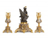 A FRENCH MANTEL CLOCK AND GARNITURE