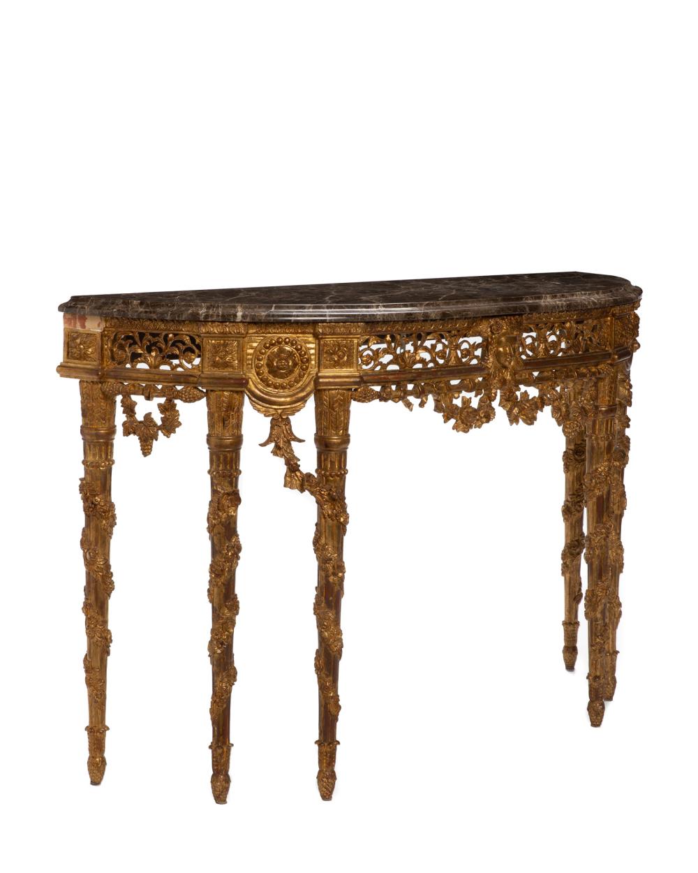 A CONTINENTAL CARVED GILTWOOD DEMI LUNE 344ac2