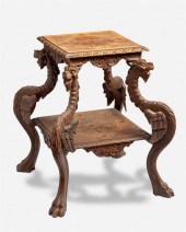 A CONTINENTAL CARVED WOOD SIDE TABLEA