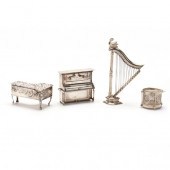 FOUR MINIATURE SILVER MODELS OF MUSICAL
