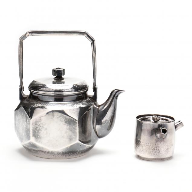 TWO JAPANESE SILVER TEAPOTS The 347b2a