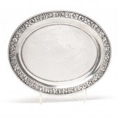 AN ANTIQUE STERLING SILVER OVAL SERVING