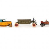 Three Painted Tin Vehicles
20th Century
comprising