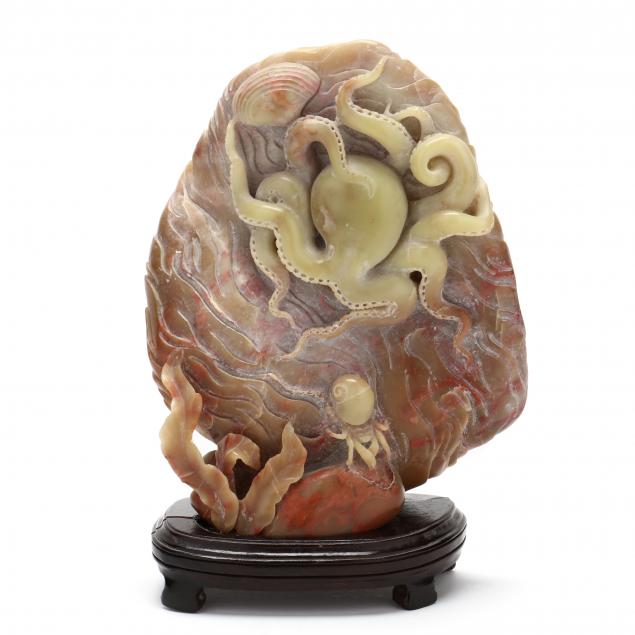 A CARVED HARDSTONE SCULPTURE WITH 3499a9