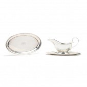A STERLING SILVER GRAVY BOAT AND OVAL