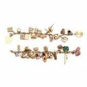 TWO VINTAGE GOLD AND GEM SET CHARM 34bb05
