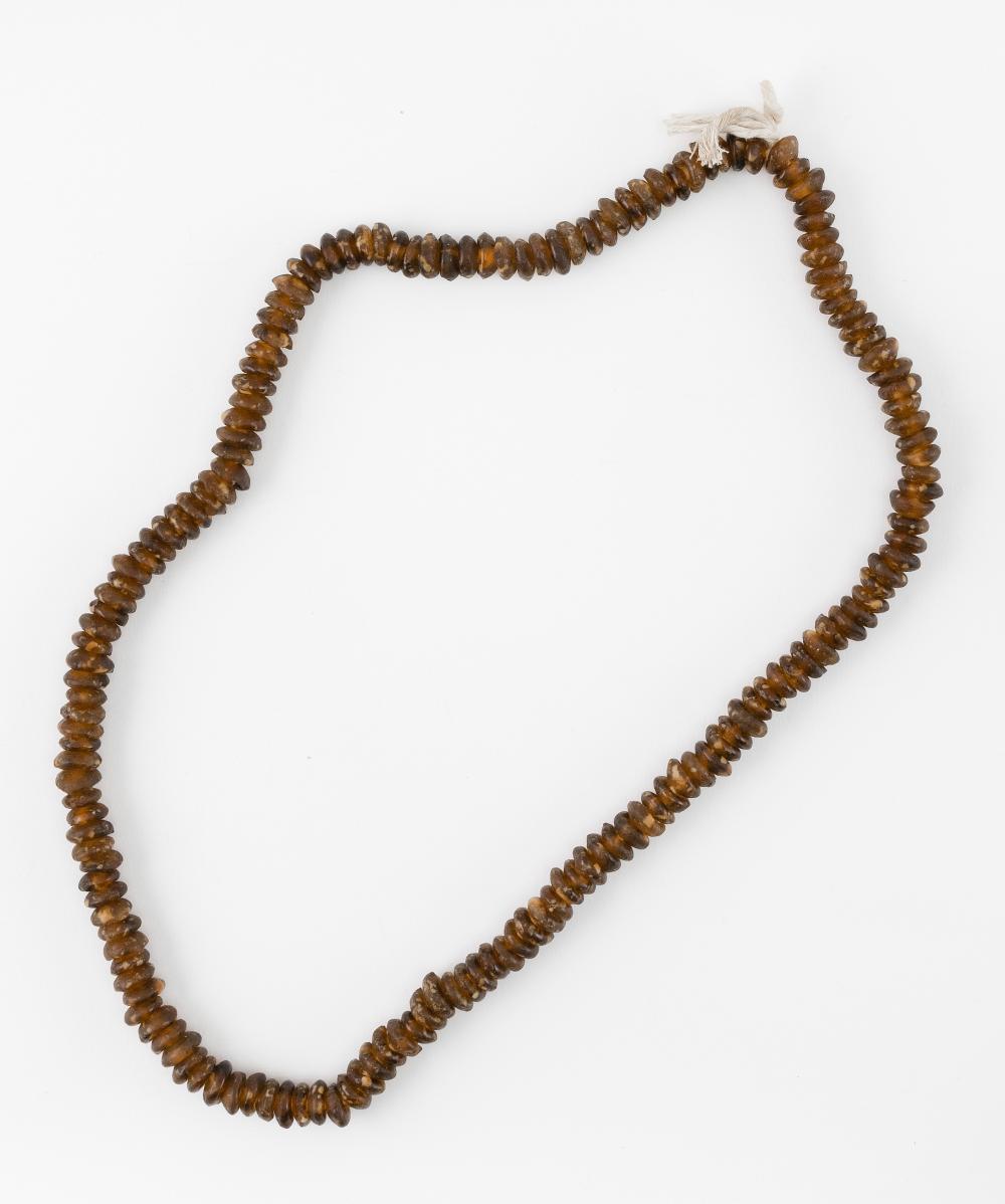 STRING OF AMBER COLORED BEADS BEAD 34bc6c