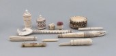 ELEVEN ASSORTED CARVED BONE, IVORY AND
