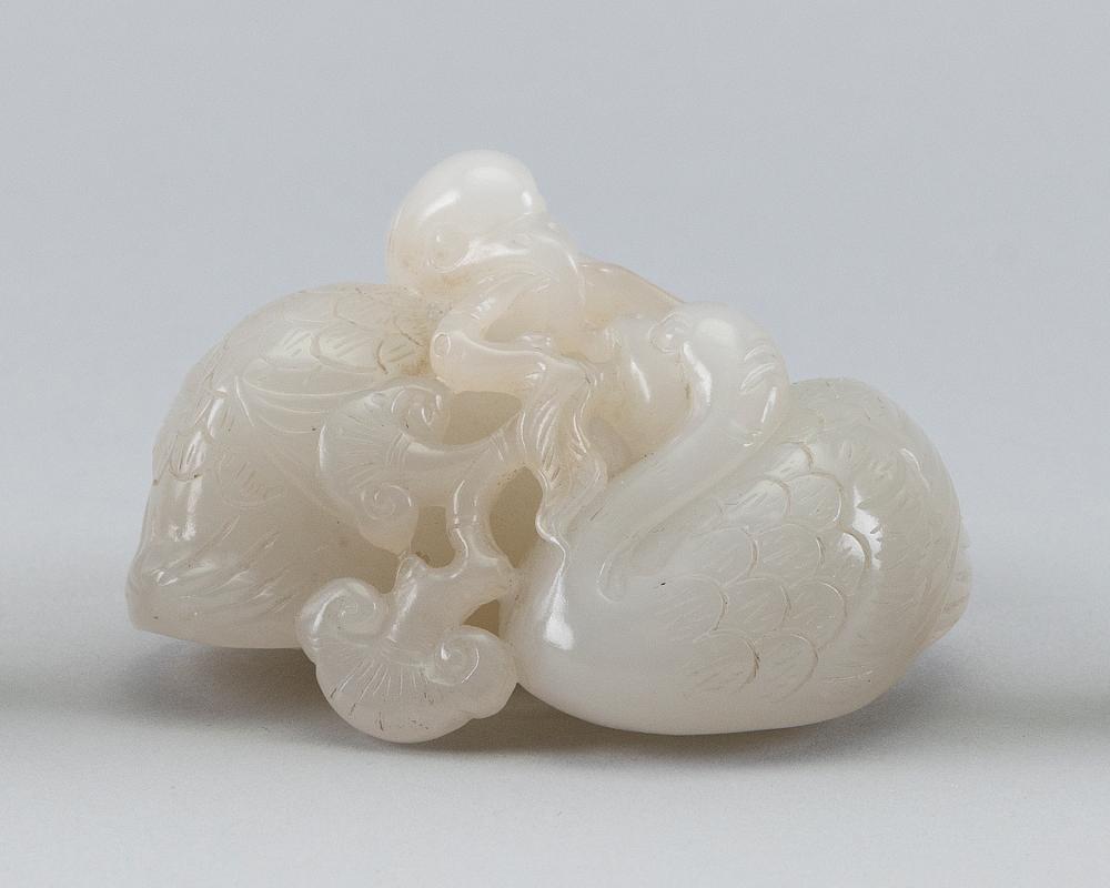 CHINESE CARVED WHITE JADE FIGURE 34c2be