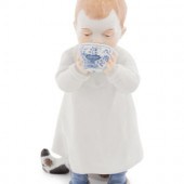 A Meissen Porcelain Figure of a Boy