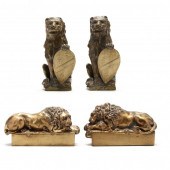 TWO PAIR OF CAST BRASS LION BOOKENDS
