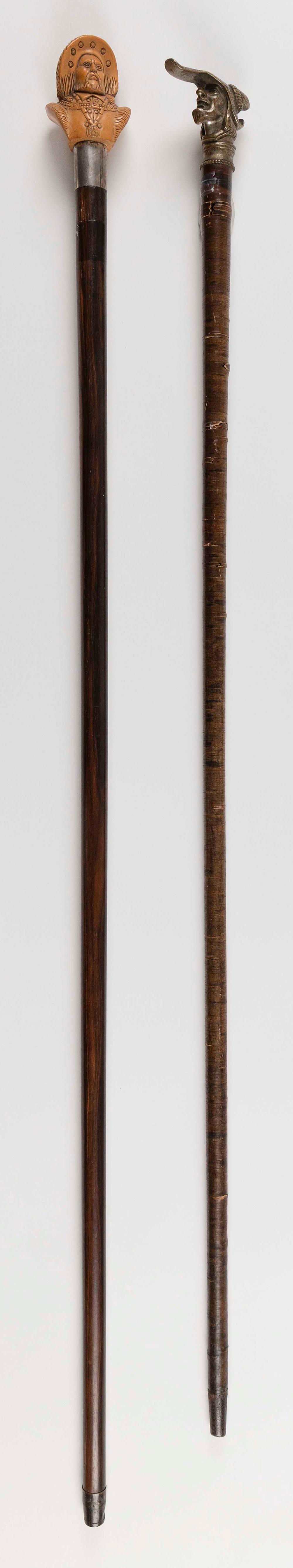 TWO WALKING STICKS WITH FIGURAL 34ebd5