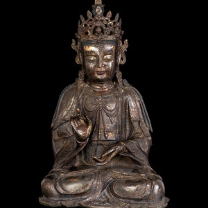 A Chinese Bronze Guanyin cast seated 3516e2