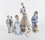 FOUR LLADRO AND ONE NAO PORCELAIN FIGURESEach