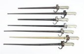 SEVEN FRENCH LEBEL BAYONETS AND SCABBARDS