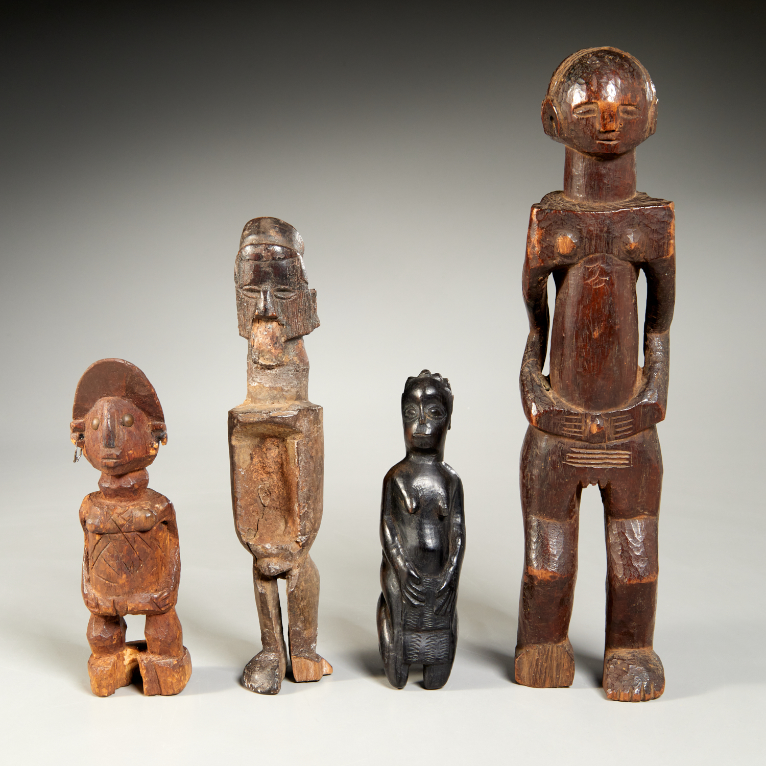  4 OLD AFRICAN CARVED WOOD FIGURES  361423