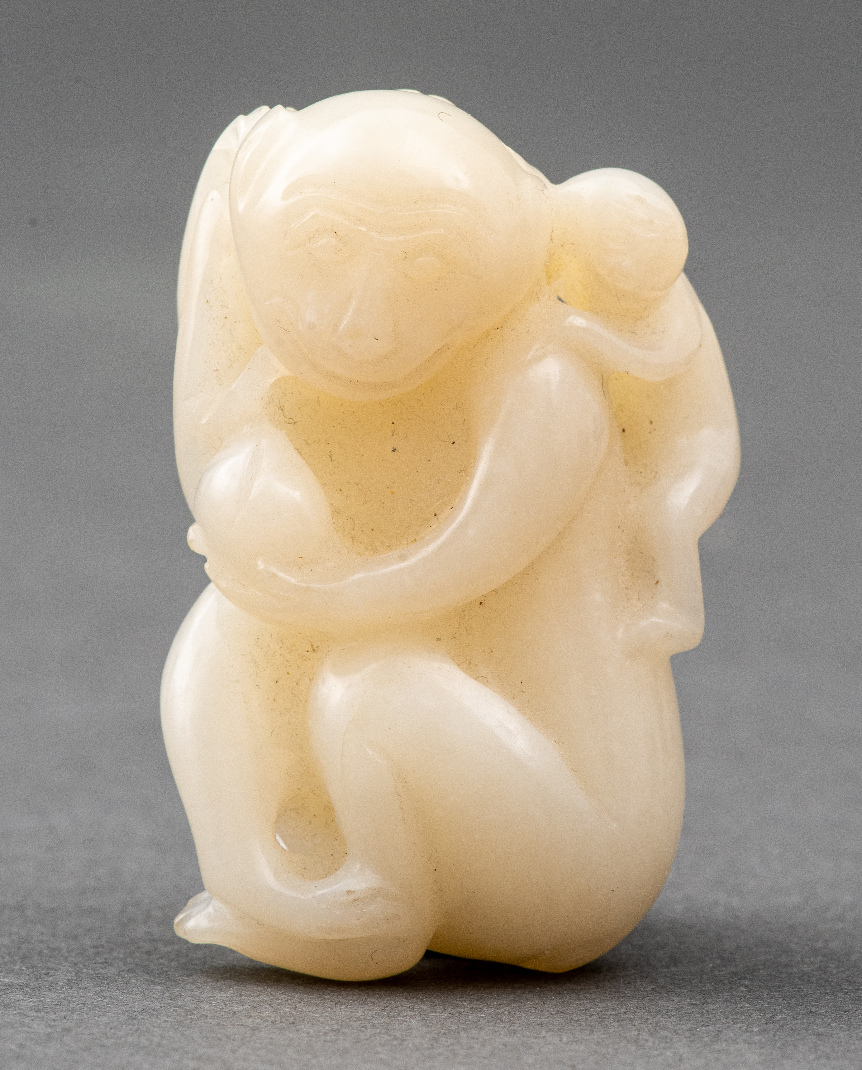 CHINESE WHITE JADE CARVING OF MOTHER 363630