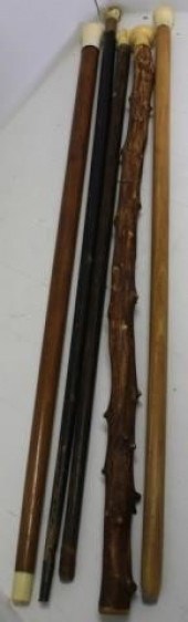 FIVE 19TH C SCRIMSHAW CANES WITH WOODEN