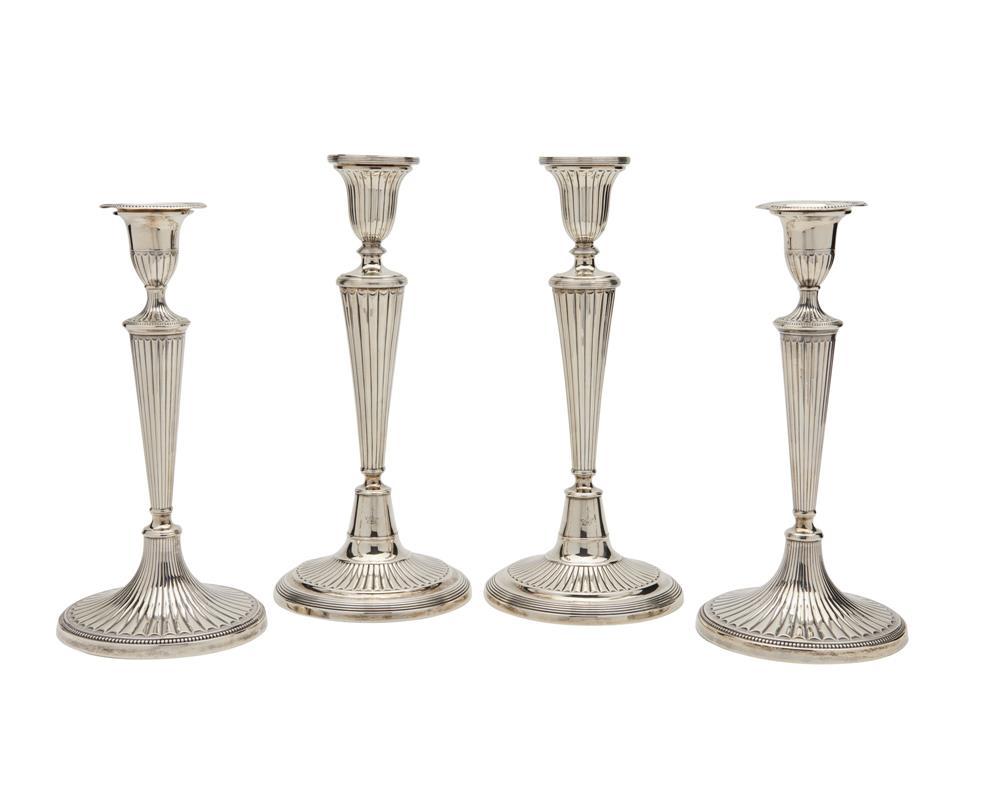 TWO PAIR OF GEORGIAN SILVER CANDLESTICKSTwo 367d77