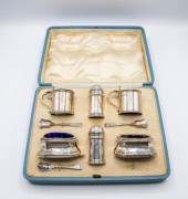 A silver cruet set, Asprey & Co., London