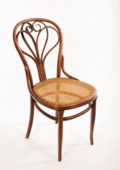 A Thonet bentwood chair with stylised