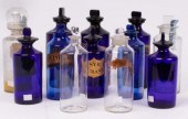 Three apothecary blue glass drug jars