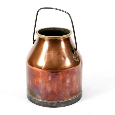 A copper milk churn, 38cm high