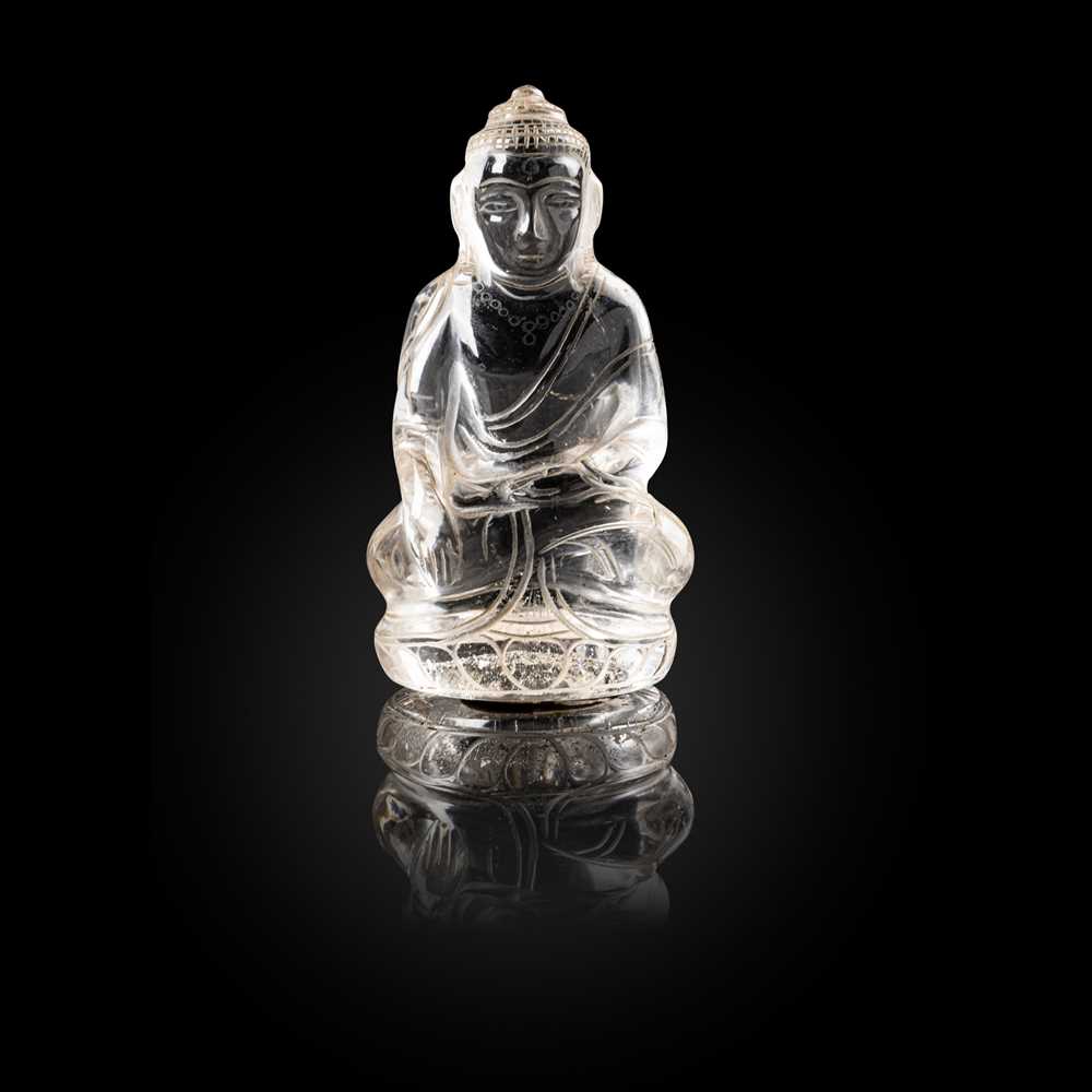ROCK CRYSTAL CARVING OF A SEATED 36e69b