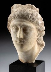 ROMAN MARBLE HEAD OF A GODDESS, POSSIBLY