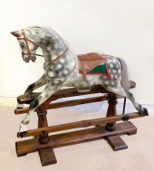 ANTIQUE ROCKING HORSE: Carved rocking