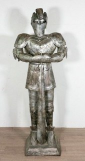 STAMPED TIN KNIGHT IN SUIT OF ARMORStamped
