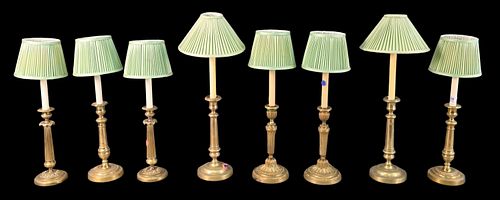 FOUR PAIRS OF BRASS CANDLESTICKSFour 375760