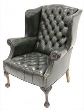 TUFTED LEATHER UPHOLSTERED WING CHAIRTufted