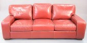 RED LEATHER SOFA WITH MATCHING CHAIR