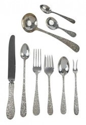 56 PIECES REPOUSSE STERLING FLATWAREAmerican,